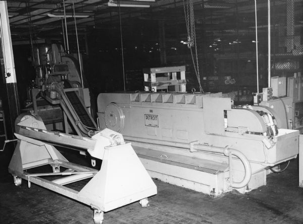 View of a Detroit Broach Machine Company machinery on factory floor.