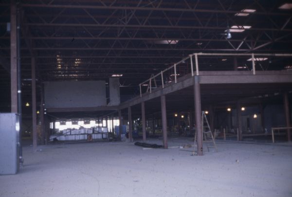 Interior view of factory building under construction.