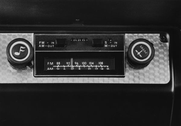 Close-up of the Scout stereo. News Photo sheet reads: "AM-FM four-speaker stereo, available with (pictured) or without an 8-track tape player is a factory option for 1979 International Scout II, Traveler and Terra models."