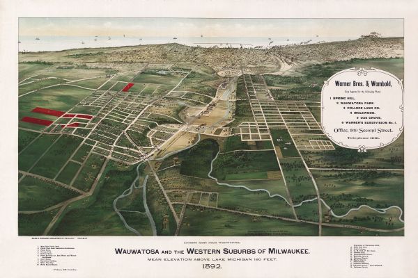 Color bird's-eye map of Wauwatosa, looking east toward Milwaukee and Lake Michigan. Predominantly green with cream colored roadways, with six land plots owned by Warner Bros. and Wambold shown in red and listed in medallion at right, center; roads clearly identified; twenty-two parks, farms, churches, civic buildings identified in location key below image; Lake Michigan with vessels in background.