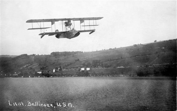 Lieutenant Patrick N.L. Bellinger, one of the first Navy flyers, piloting a U.S. Navy flying boat during the U.S. occupation of Vera Cruz, Mexico. During this assignment, Bellinger became the first American pilot to return to base with bullet holes in his craft.