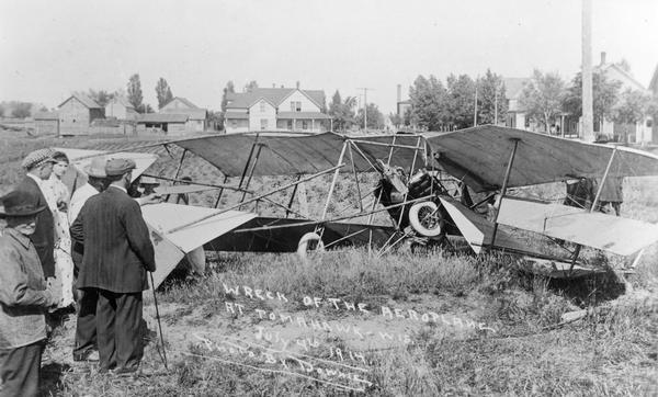 The wreck of John Kaminski's plane, where he had been scheduled to fly at the Fourth of July festivities.