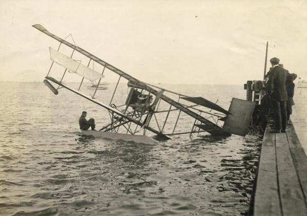 An unsuccessful test of Glenn Curtiss' hydroplane in San Diego Bay. The pilot about to be rescued is thought to be Milwaukee's John Kaminski.
