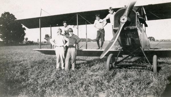 Horace Hill, Pete Brandenberg, and unidentified children at the Beloit Airport with a Canuck airplane rebuilt by Allen Loveland. Surplus Canucks, as the Curtiss planes built in Canada during World War I were known, were inexpensive and plentiful in Wisconsin. These conditions had much to do with the growth of interest in aviation during the 1920s.
