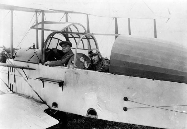 Rellis G. Conant, a former World War I aviator, barnstormer, and attorney, in his Standard J1 airplane with a passenger in the front seat. Conant died in a fatal plane crash when the student pilot that he was teaching froze at the controls.
