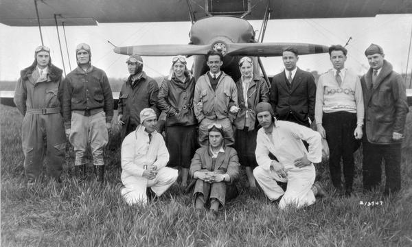 The Waukesha Flying Club and their jointly owned Waco 10. The members are (row 1, left to right) Charles Gittner, Joe Rombough, and Roy Winzenreid and (row 2) Walter Hausser, Lee Barney, Edward Boehmke, Margaret Hausser, Roy Huggins, Kathleen Eder, Russell Schuetze, Ellsworth Schuetze, and Warren O'Brien. Unfortunately, the club found their plane expensive to maintain, and it was sold in 1933. Fortunately, the club continued.