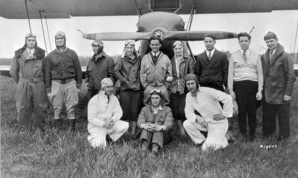 The Waukesha Flying Club and their jointly owned Waco 10. The members are (row 1, left to right) Charles Gittner, Joe Rombough, and Roy Winzenreid and (row 2) Walter Hausser, Lee Barney, Edward Boehmke, Margaret Hausser, Roy Huggins, Kathleen Eder, Russell Schuetze, Ellsworth Schuetze, and Warren O'Brien. Unfortunately, the club found their plane expensive to maintain, and it was sold in 1933.  Fortunately, the club continued.