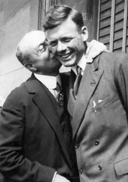 Charles Lindbergh in Paris, being embraced by Louis Bleriot.