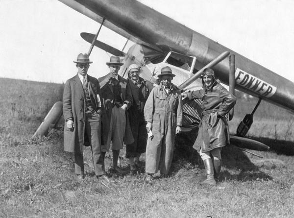 Harry Bruno (second from the left), publicist for airplane builder Anthony Fokker, during the first Ford Air Reliability tour with Paul Smith, Bryce Goldsborough, pilot Wilmer Stultz, and co-pilot Ray Howard. The plane, which Fokker had planed to use in the competition, went down en route to the start of the tour, and as a result, Fokker had to use a backup plane.
