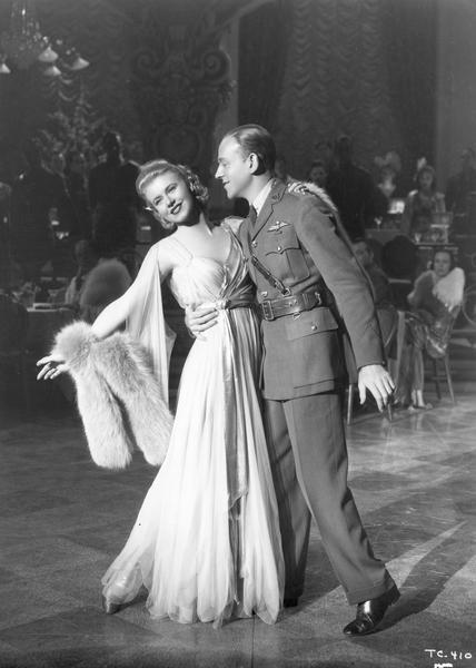 Fred Astaire and Ginger Rogers in the motion picture, "The Story of Vernon and Irene Castle" (RKO, 1939).  Although Astaire and Rogers were ideally cast to portray the glamorous Castles, the "Story of Vernon and Irene Castle" was one of the least successful films that the pair made together in part because of the necessity of depicting Vernon's tragic death as a flight instructor during World War I.