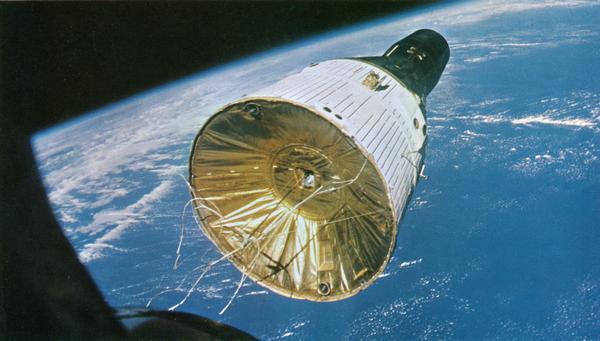 The Gemini 7 spacecraft as photographed by the Gemini 6 crew, 160 miles above the earth.  The two-man crew of Gemini 7 included Frank Borman and James A. Lovell of Milwaukee, Wisconsin.  This image is among the NASA press materials collected by NBC reporter Robert Goralski.  His papers are available for research at the Wisconsin Historical Society Archives.