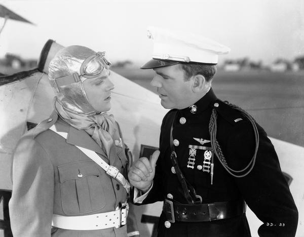 A publicity still from "Devil Dogs of the Air," (Warner Brothers 1935) in which Milwaukee-born Pat O'Brien appeared with Jimmy Cagney. In this production, Cagney and O'Brien play two Marine Corps flyers who fall for the same girl.  Although chiefly remembered for his portrayal of priests and football coaches, Pat O'Brien also played in action adventures during the earlier years of his career.