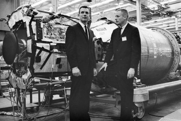 Astronauts Neil A. Armstrong (right) and David R. Scott, the two-man crew scheduled to fly Gemini 8, visiting the Lockheed plant where the Agena target vehicle was built. The astronauts' visit was part of a Lockheed public relations campaign to draw attention to the Agena rocket and explain past failures. Armstrong and Scott inspected the Agena before it was shipped to Cape Kennedy for launch. They successfully docked with the Agena, although a malfunctioning thruster necessitated an early end to the mission. A history of this public relations campaign was submitted by Lockheed to an award competition of the Public Relations Society of America. PRSA records are available for research at the Wisconsin Historical Society Archives.
