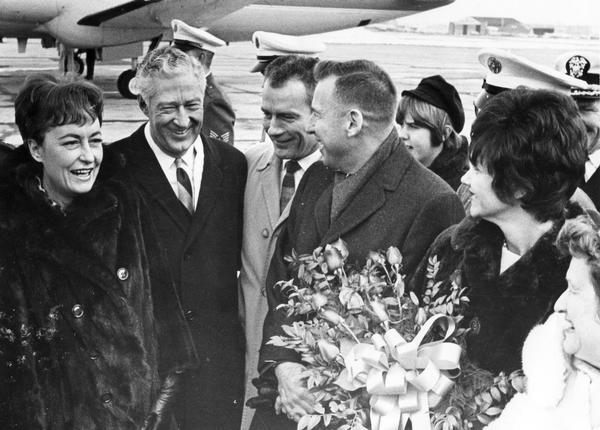 Greeting astronaut James A. Lovell (4th from the left) and his wife at the airport are Wisconsin Governor Warren P. Knowles (2nd from the left) and Mrs. Dorothy Knowles. At this time Lovell had already flown in two Gemini missions. Between Knowles and Lovell, is Astronaut Donald K. "Deke" Slayton of Sparta. Although selected as part of the original Mercury 7 astronauts, Slayton's space travel was then on hold because of his health.