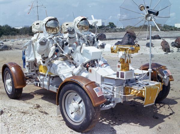 Astronauts Eugene Cernan and Harrison Schmitt practice operating the lunar roving vehicle (LRV) in preparation for the Apollo 17 mission to the moon. They are practicing on a rocky beach near the Kennedy Space Center in Florida. This photograph is part of the NASA press material collected by ABC science reporter, Jules Bergman. Bergman's papers are available for research at the Wisconsin Historical Society Archives.