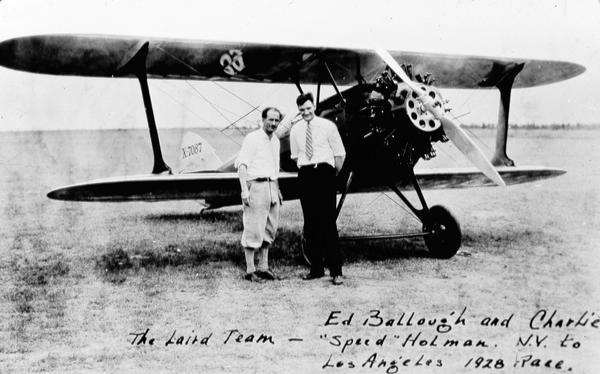 Charles "Speed" Holman and Ed Ballough, the Laird Team, after the New York to Los Angeles air race. Minnesotan Charles Holman earned his nickname by racing motorcycles, but in 1919 he discovered aviation.  In 1926 Holman became the first pilot for Northwest Airways, and in the following years he flew airmail and passengers to several Wisconsin cities. Holmen also competed in the National Air Races, and he won the first Thompson Trophy in 1930 while flying a Laird Wasp. Holmen died the following year at the Omaha Air Races.