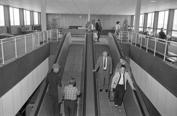 The waiting room and escalator at Austin Straubel Airport's new passenger terminal. Austin Straubel became the Brown County airport in 1948, replacing Blesch Field. In keeping with wartime practice, the field was named in honor of Green Bay's Austin Straubel, a lieutenant colonel in the U.S. Army Air Corps who was killed in the Pacific in 1942.