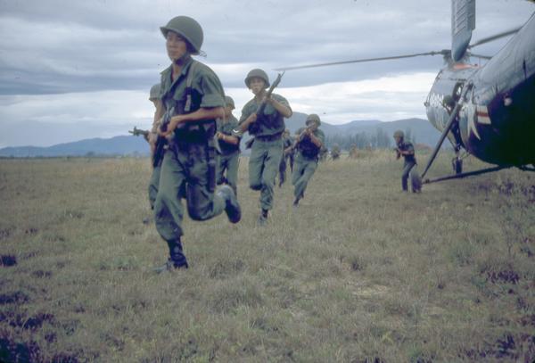 Training exercise for South Vietnamese soldiers in helicopter deployment. This photograph of the early stages of American involvement in the war in Vietnam was taken by Milwaukee photographer Dickey Chapelle. Publication of her work provided the American public with an early exposure to the nature of that conflict.