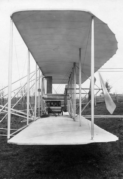 An original vintage print from the Arthur Pratt Warner collection of a two-seat Wright airplane. The airplane is identified on the print only as a 1910 machine, but is not known where the photograph was taken or under what circumstances Warner obtained it. Warner attended several exhibitions in 1910 at which Wright planes were flown, and perhaps he obtained it then.  Nevertheless, the print affords an excellent close view of the construction of a Wright airplane.