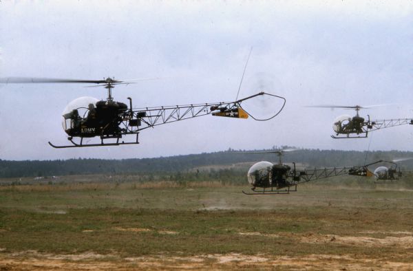 Bell Model 47 light observation helicopters during a training exercise at Fort Benning, Georgia. One of the most popular helicopters ever built, the Model 47 was in production in various configurations from the mid-1940s to the mid-1970s. The H-13 model was used for medical evacuations during the Korean War, and it was featured in the M*A*S*H television series.