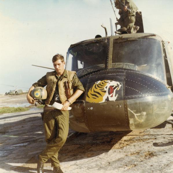 Helicopter pilot Scott Alwin, a native of Fort Atkinson, Wisconsin, with his UH-1 ("Huey"). Alwin spent five tours of duty in Vietnam from 1967 to 1972, serving in one of the most dangerous assignments of the war. He is believed to have clocked more air time than any other American in the war. He was awarded 5 bronze stars, a silver star, a distinguished flying cross, a purple heart, and 136 oak leaf clusters. Alwin received a field commission to 2nd lieutenant and was promoted to captain. He resigned the commission in order to remain in flight status. Scott Alwin was killed by a drunk driver in 1976. 
