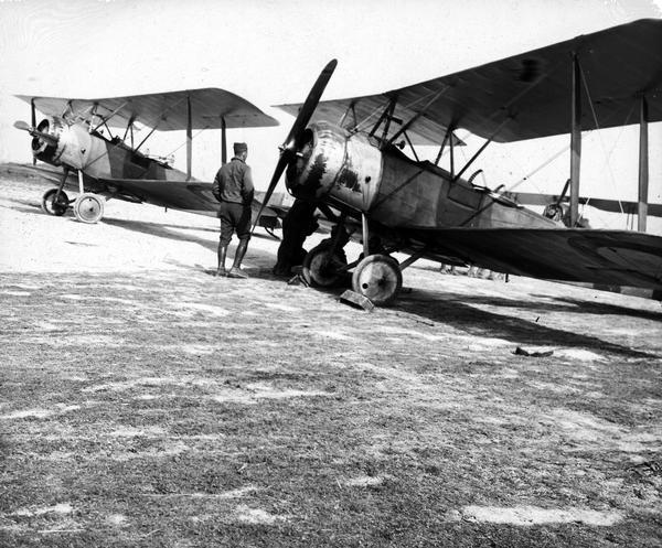 Two Sopwith Camels, somewhere in France. This image is from the photo collection of Alvin Reis of Madison. He made many wartime photos into lantern slides to illustrate his public lectures about World War I.