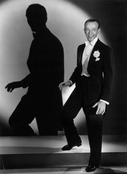 Fred Astaire, dance star, who is teamed for the first time with  Eleanor Powell in Metro-Goldwyn-Mayer's "Broadway Melody of 1940". The musical was brought to the screen by Jack Cummings, and directed by Norman Taurog.