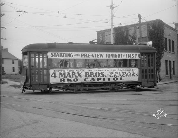 Streetcar advertising the Marx Brothers in "Animal Crackers" at the RKO Capitol Theatre.