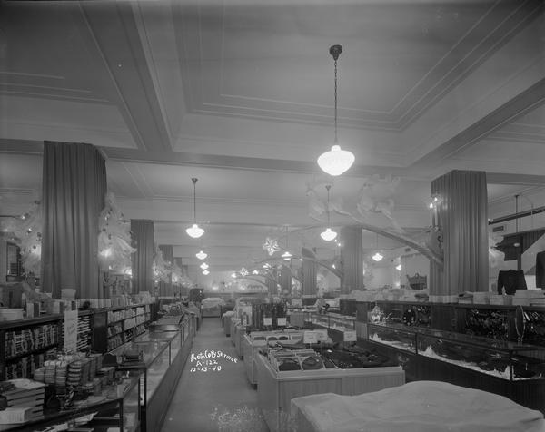 Interior of Manchester's Department store on the main floor during the Christmas season. The store was located at 2 East Mifflin Street.