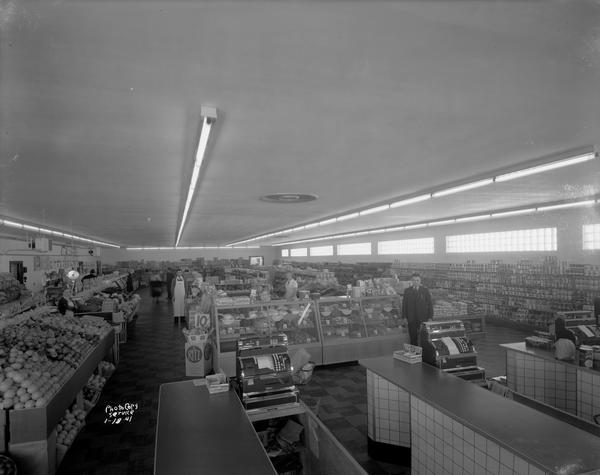 Elevated view of the interior of 20th Century Market, 2701 University Avenue, with checkout counters and merchandise displays.