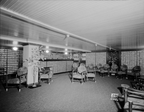 The shoe department in Burdick & Murray Co., located at  15-19 E. Main Street.