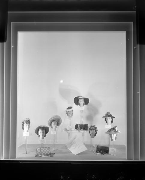 Harry S. Manchester's Inc., with window display of spring hats. The store was located at located at 2-6 East Mifflin Street.