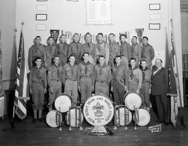 Group portrait of the all-Eagle Four Lakes Boy Scouts Drum and Bugle Corps with their director, from Madison, Wisconsin.