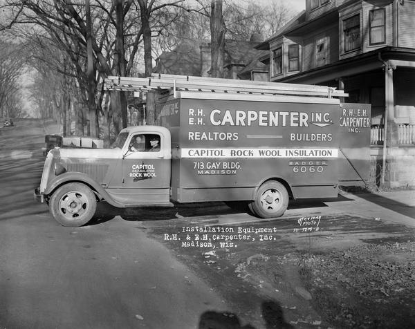 R.H. and E.H. Carpenter Capitol Rock Wool insulation truck parked in front of 309 North Pinckney Street.