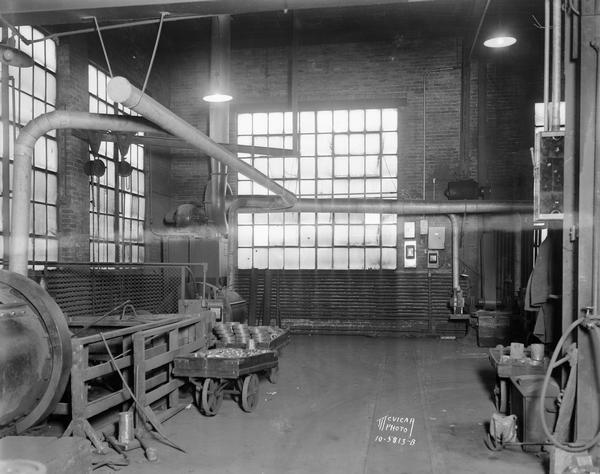Air filtration machinery and piping at the Gisholt Plant located in the  1200 — 1300 blocks of East Washington Avenue.