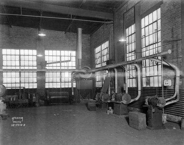 Air filtration machinery and piping at the Gisholt Plant, located in the 1200 - 1300 blocks East Washington Avenue.