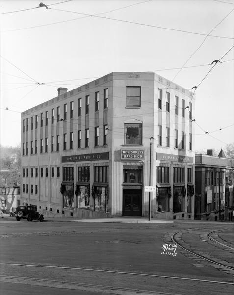 Montgomery Ward & Co. at 102 North Hamilton Street at the corner of North Pinckney and East Mifflin Streets.