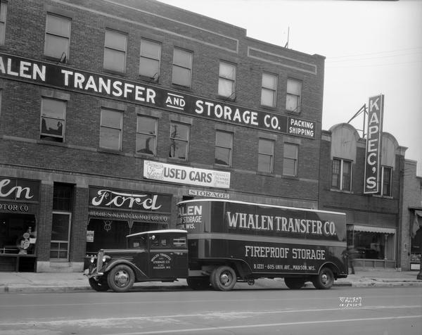 Whalen Transfer and Storage building, 605 University Avenue, with a company truck/trailer parked in front. Also seen is Kapec Furniture Co., 607 University Avenue, and Hughes Newman Motor Co., 601 University Avenue.