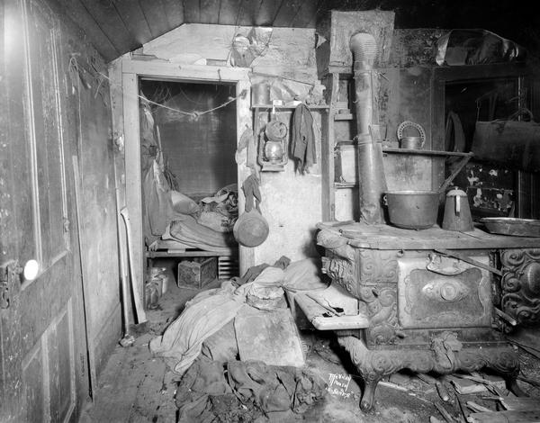 Interior of hermit George Smith's squalid shack, 2 miles southwest of Cottage Grove.