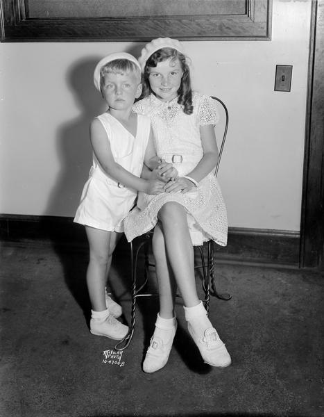 Portrait of boy and girl, Jackie and Patsy Paige, stage names of child film actors, children of Mr. & Mrs. Lincoln Rengstorff. They were in town visiting their grandmother, Mrs. Edna Rengstorff of 421 North Murray Street.