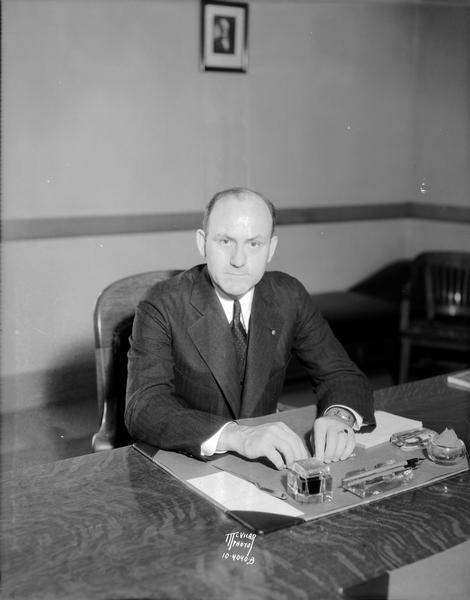 Portrait of U.S. Federal Judge Patrick T. Stone sitting at his desk.