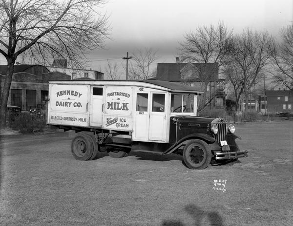 Kennedy Dairy Company, 621-629 W. Washington Avenue, milk truck, advertises their products, Selected Guernsey Milk, Pasteurized Milk, and Kennedy's Ice Cream.