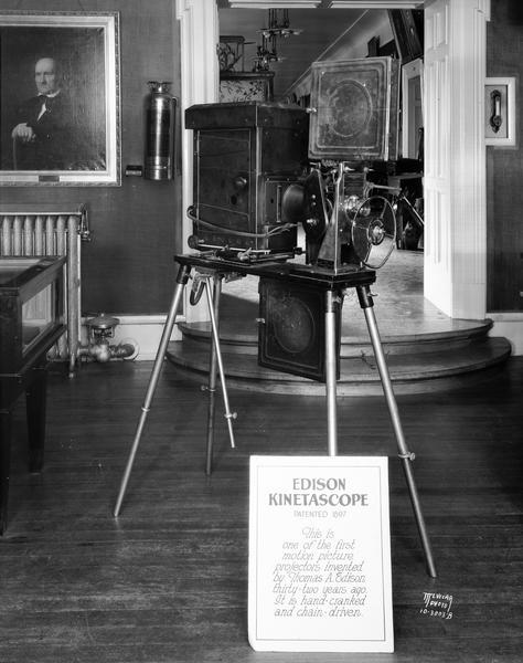 Edison kinetascope, patented in 1897, one of the first motion picture projectors invented by Thomas A. Edison. It is hand cranked and chain driven.