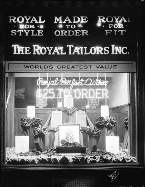 Royal Tailors, Inc. display window located at 12 East Mifflin Street, with neon advertising.