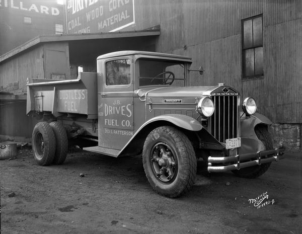 A new J.B. Drives Fuel Company dump truck made by Diamond T waiting for a load at 303 S. Patterson Street.