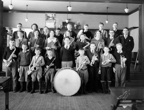 Students pose with their instruments for a group portrait of the Middleton High School band.