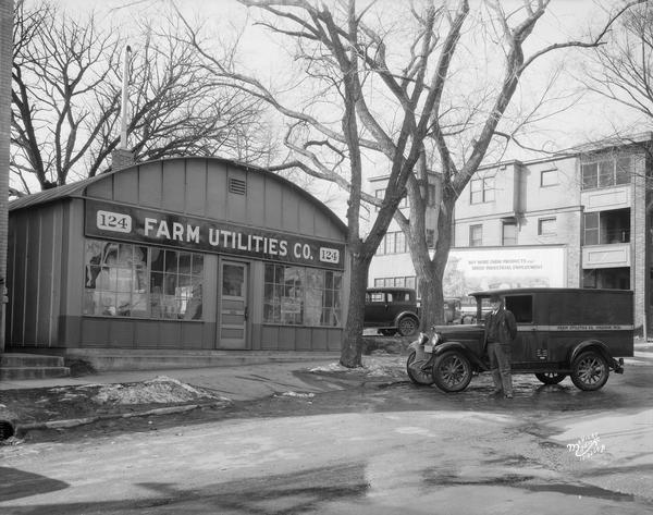 Farm Utilities Company, located at 124 S. Butler Street. (A Trachte building.)