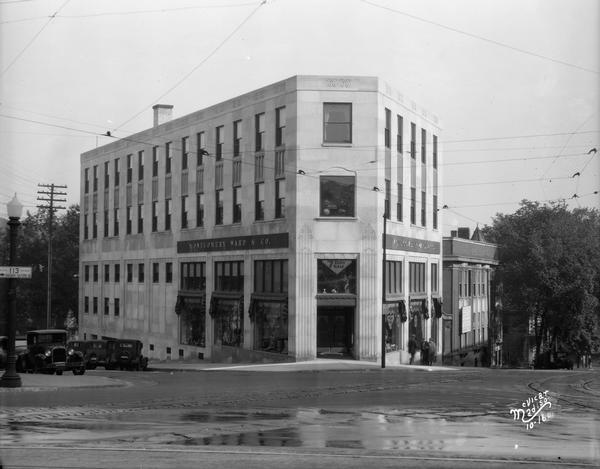 View of the Montgomery Ward Store, on the corner at 102 N. Hamilton Street.