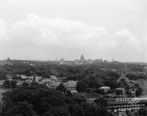 Aerial view of the Madison skyline from University of Wisconsin Field House, overlooking the Wisconsin State Capitol and, in the foreground, Gateway Lumber Company, 1429 Monroe Street.