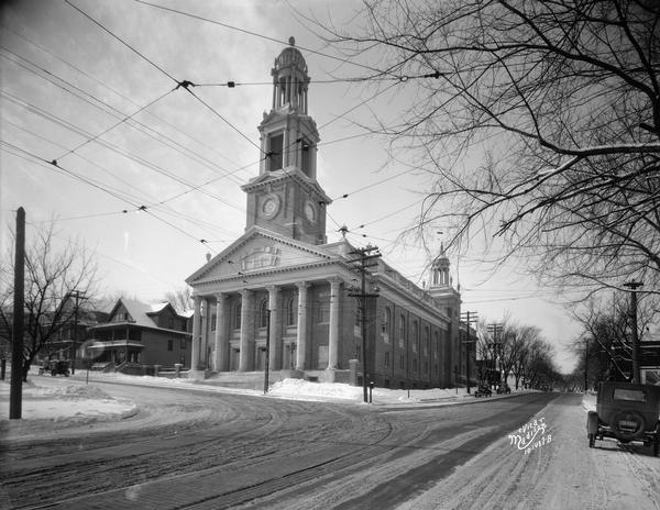 First Congregational Church, 1609 University Avenue, at the corner of North Breese Terrace, looking west along University Avenue. Snow is on the ground.